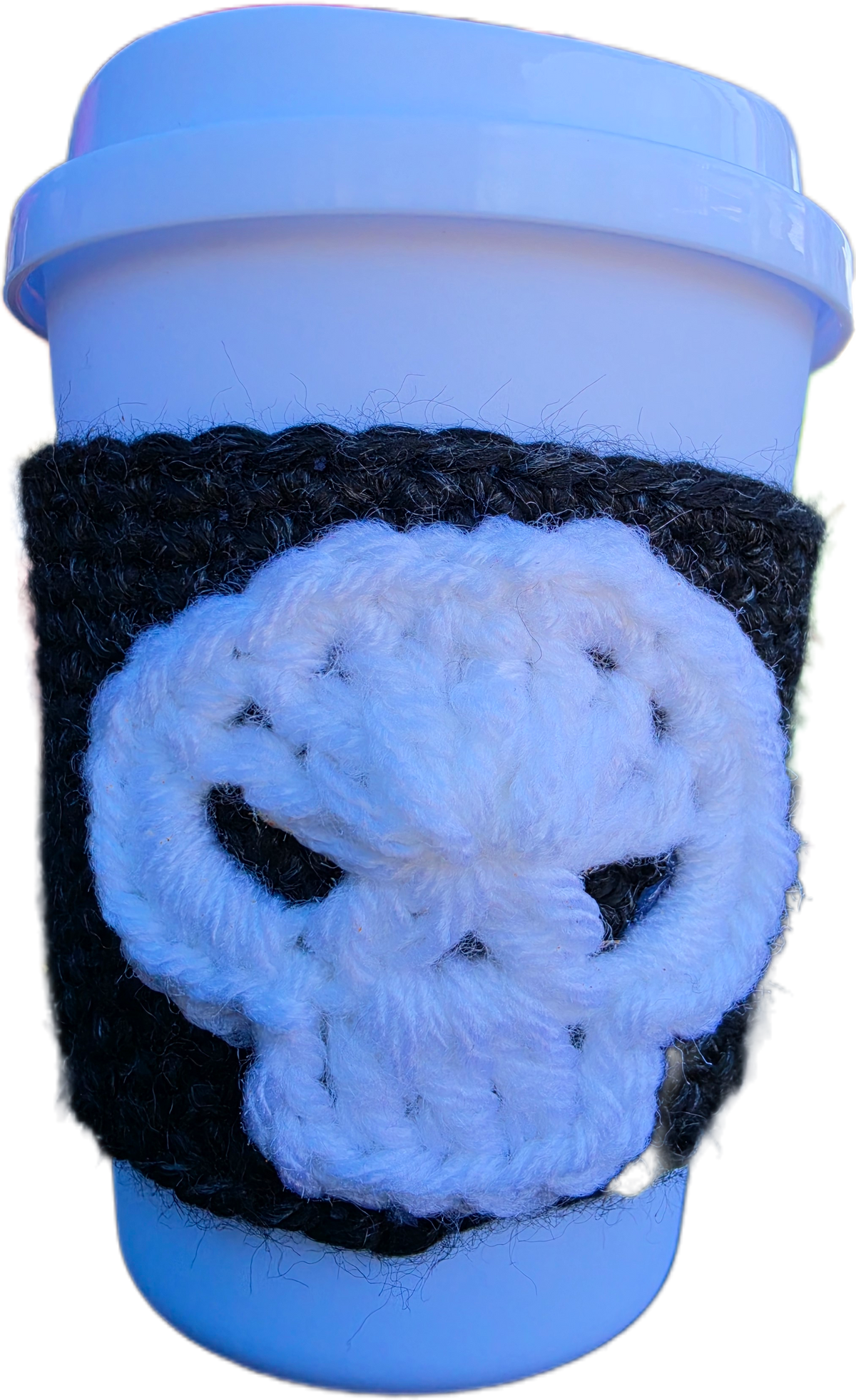 Reusable coffee cup with cozy